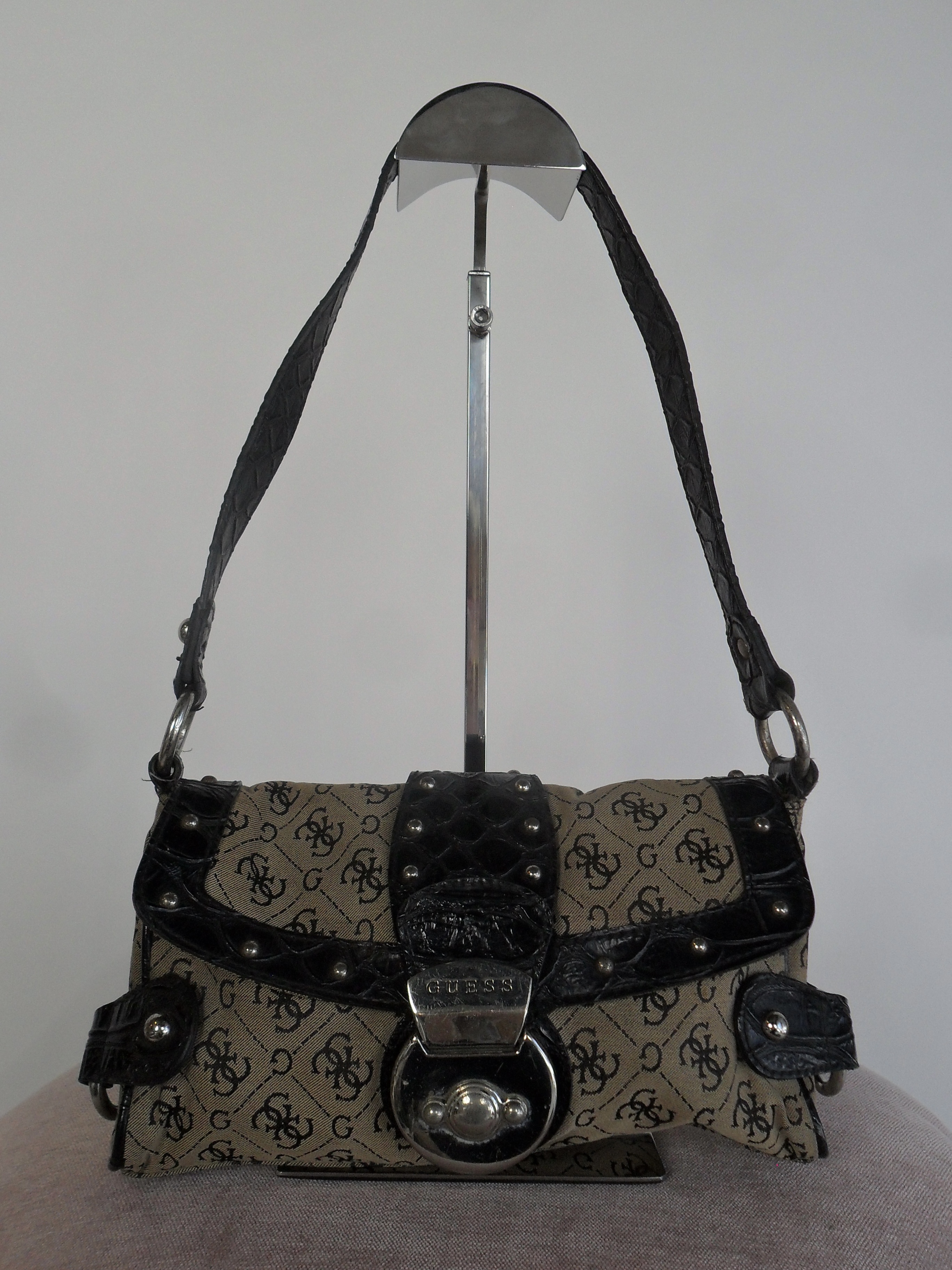 Guess with black buckle trim