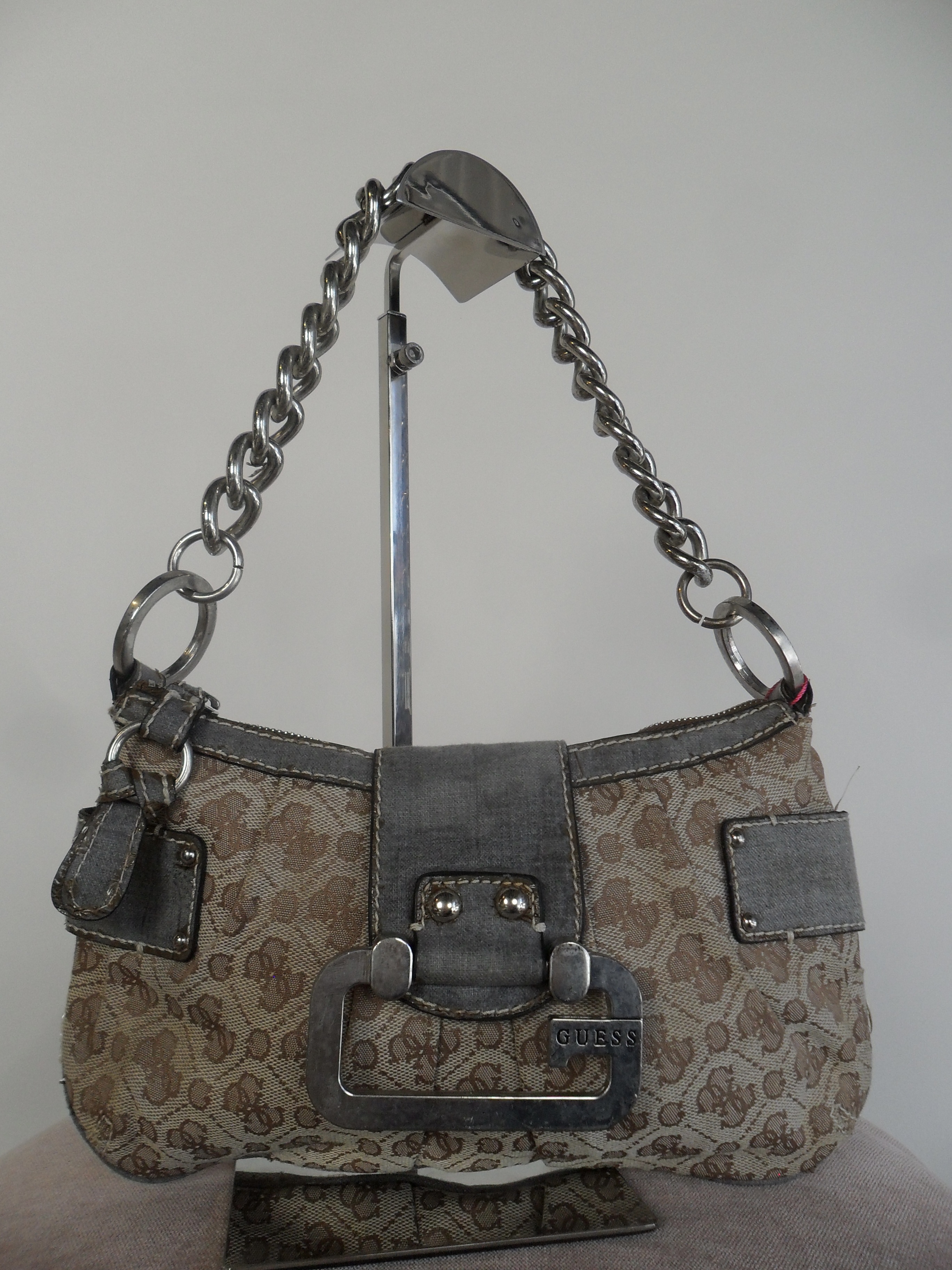 Guess with a chunky chain